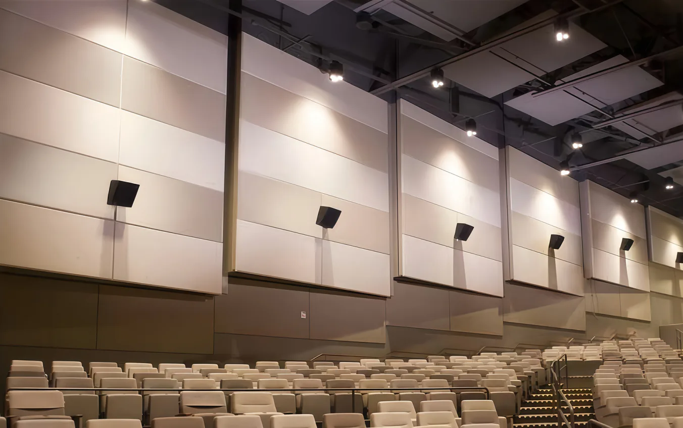 Supplier-provided auditorium reference showing fabric-wrapped wall panels