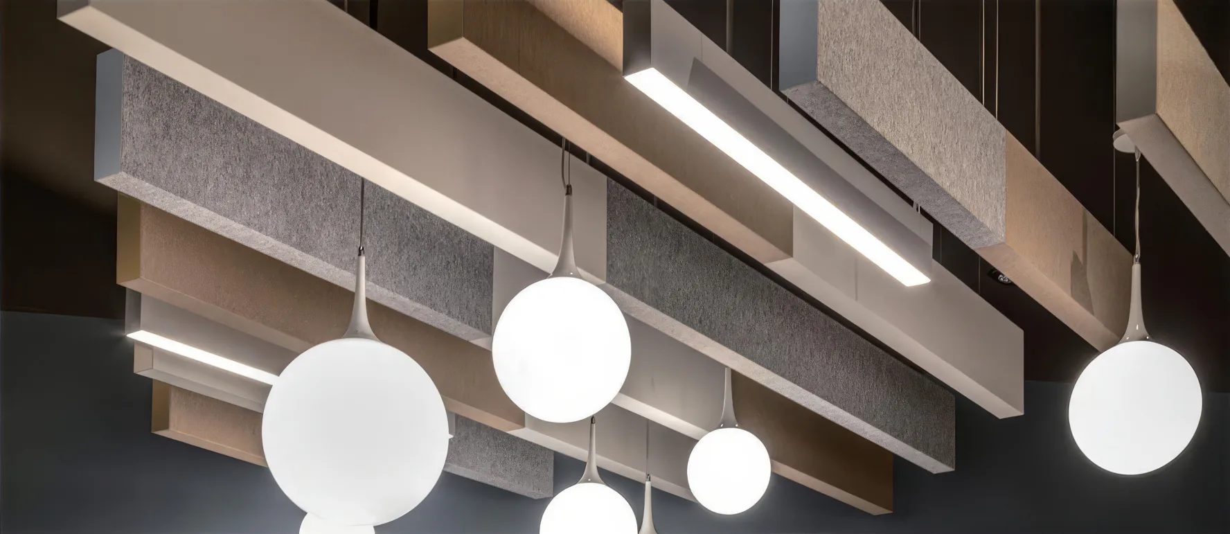 Supplier-provided visualization of layered acoustic baffles around pendant lighting