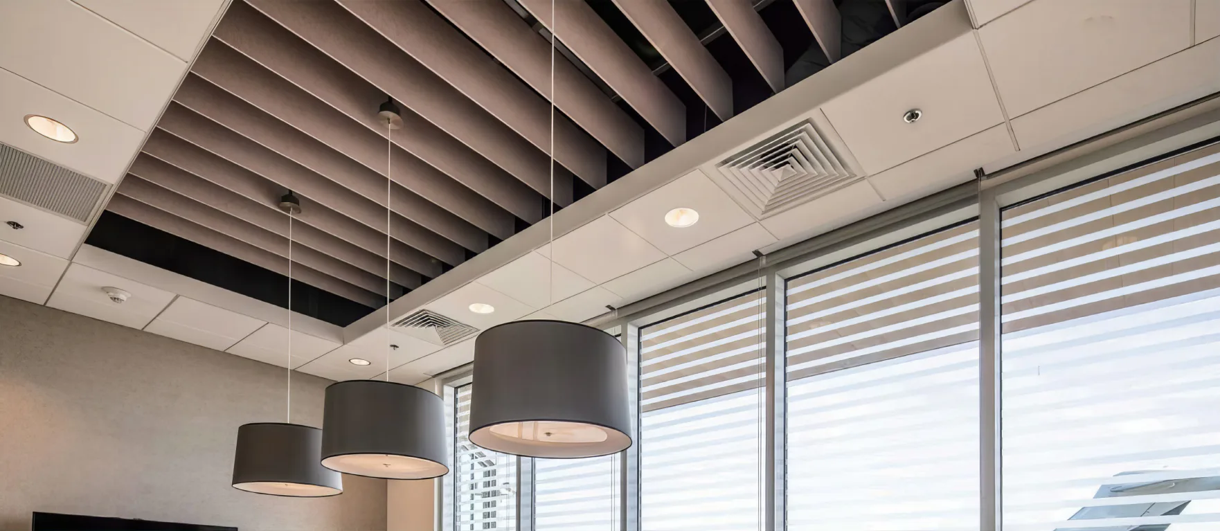 Supplier-provided visualization of straight acoustic baffles in an office ceiling