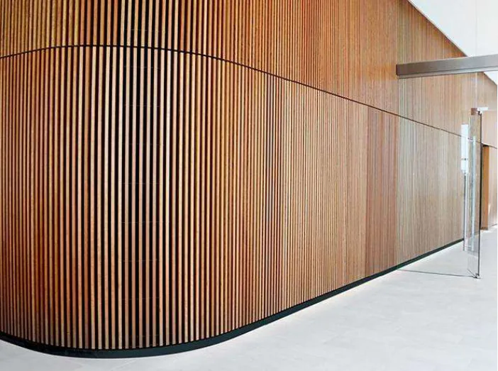 Supplier product-reference image showing slats applied around a curved wall